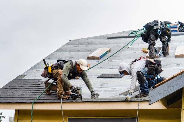 Professional Gutter Installation technician working in Wade, MS